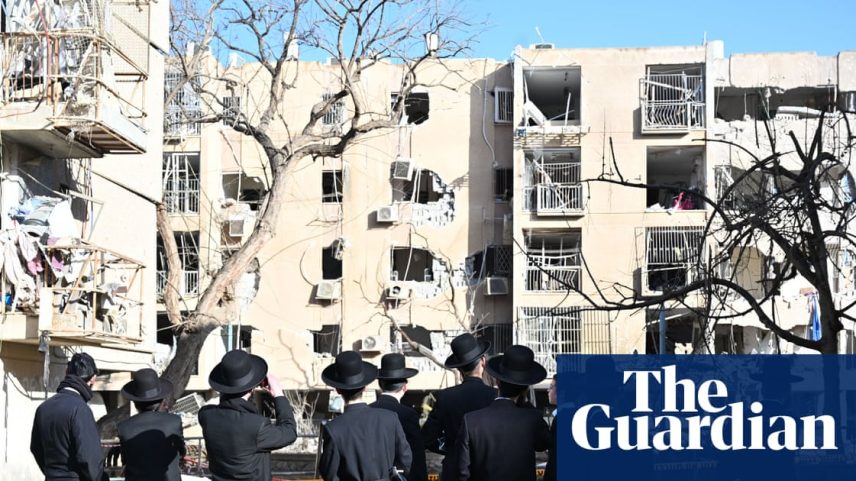 Damaged apartment buildings in Ramat Gan after an Iranian missile strike on 22 March. Photograph: Paulina Patimer/Zuma Press Wire/Shutterstock