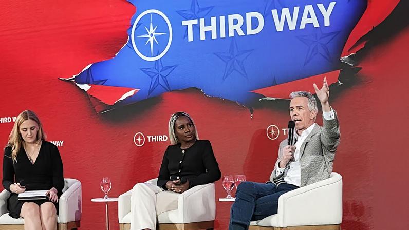 The former Republican congressman Joe Walsh with moderator Sarah McCammon and panelist Yemisi Egbewole in Charleston on Monday.