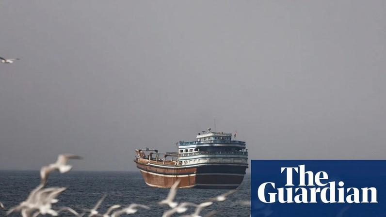 Container ships are moored in Cape Town, South Africa, after shipping companies announce they will reroute vessels.