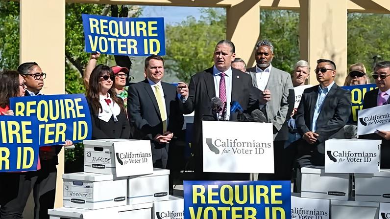 Tony Strickland speaks at for a press conference highlighting voter signatures in favor of placing a voter ID measure on the November ballot.