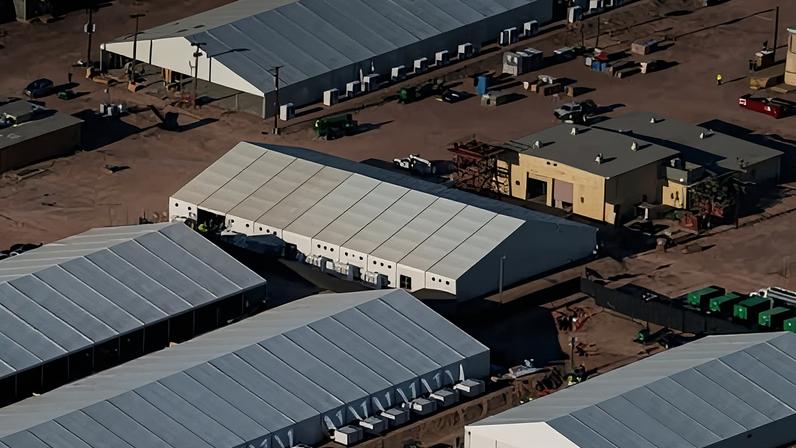 An aerial view shows tents at an ICE detention facility, being built to house migrants, at Fort Bliss in El Paso, Texas, on 8 August 2025.