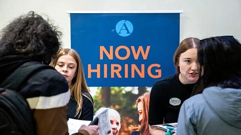 Recruiters speak to jobseekers during the WorkSource North Seattle career fair on 10 February 2026.