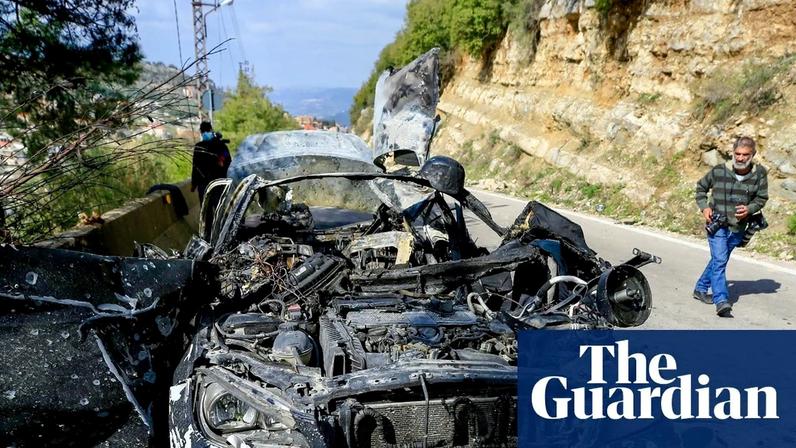 Destroyed wreckage of a car on a road