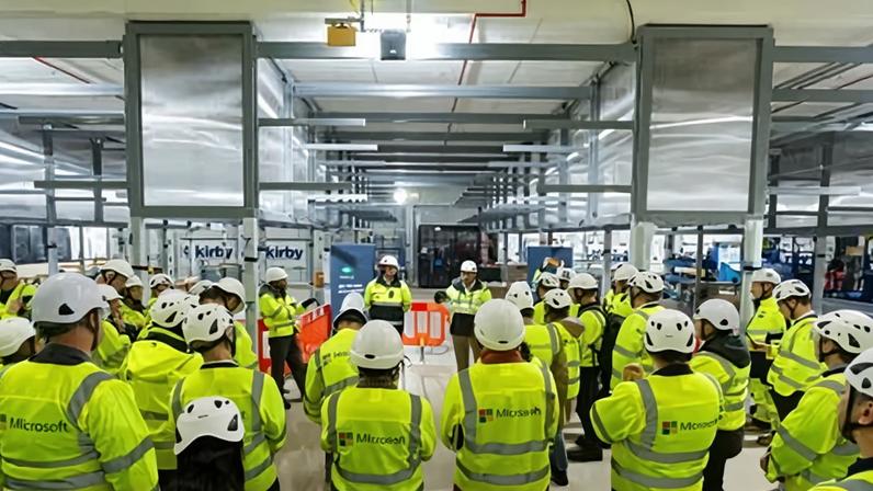 Members of the media tour a Microsoft datacentre during construction outside Newport, Wales.