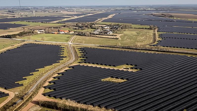 The village of Hjolderup in Denmark, which is surrounded by solar panels.