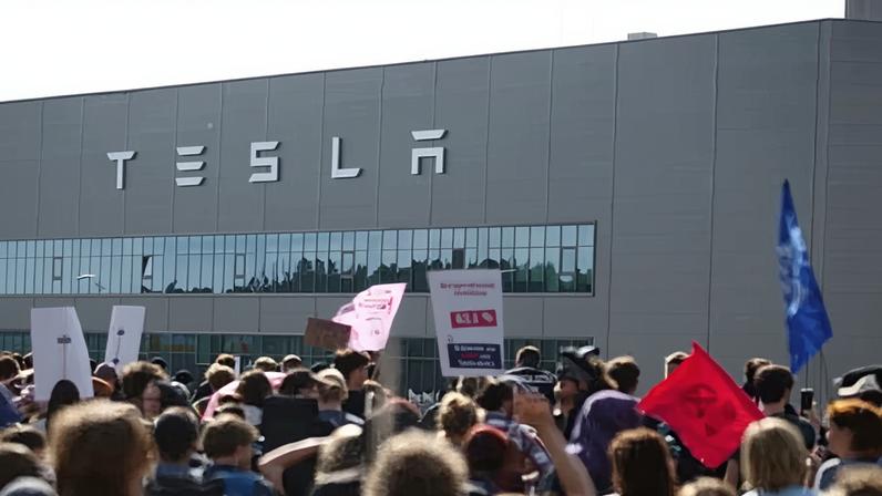 Environmental protesters at the Tesla factory in Grünheide near Berlin. Musk has said union disputes could put investment at risk.