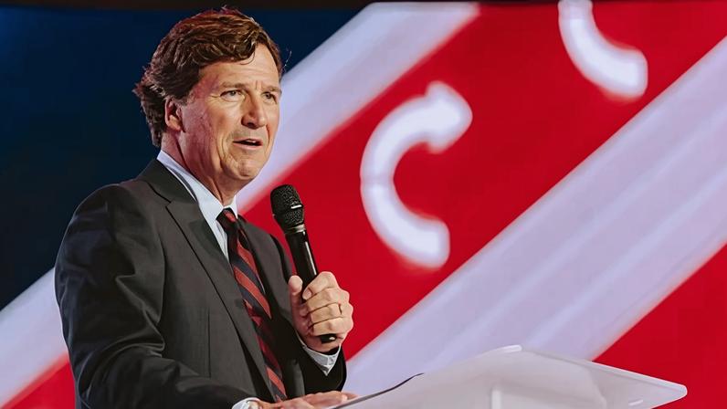 Conservative political commentator and podcast host Tucker Carlson speaks at Turning Point's annual AmericaFest conference in Phoenix, Arizona, on 18 December 2025.