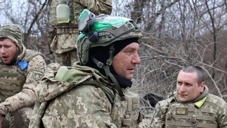 Ukrainian armed forces personnel rest near the Zaporizhzhia frontline.