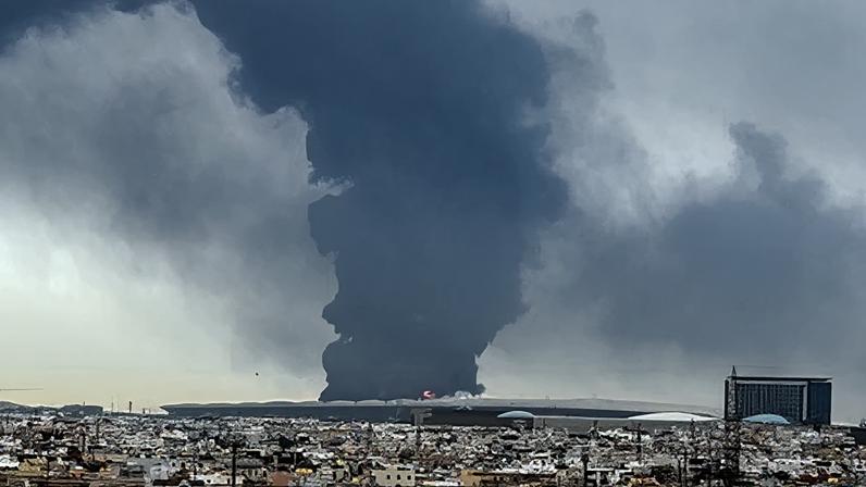 Smoke billows from a fuel depot at Kuwait international airport after an Iranian attack.