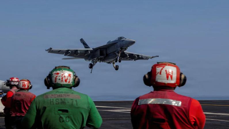 An F/A-18E Super Hornet prepares to make an arrested landing on the flight deck of the U.S. Navy Nimitz-class aircraft carrier USS Abraham Lincoln in support of the Operation Epic Fury attack on Iran from an undisclosed location March 2, 2026.