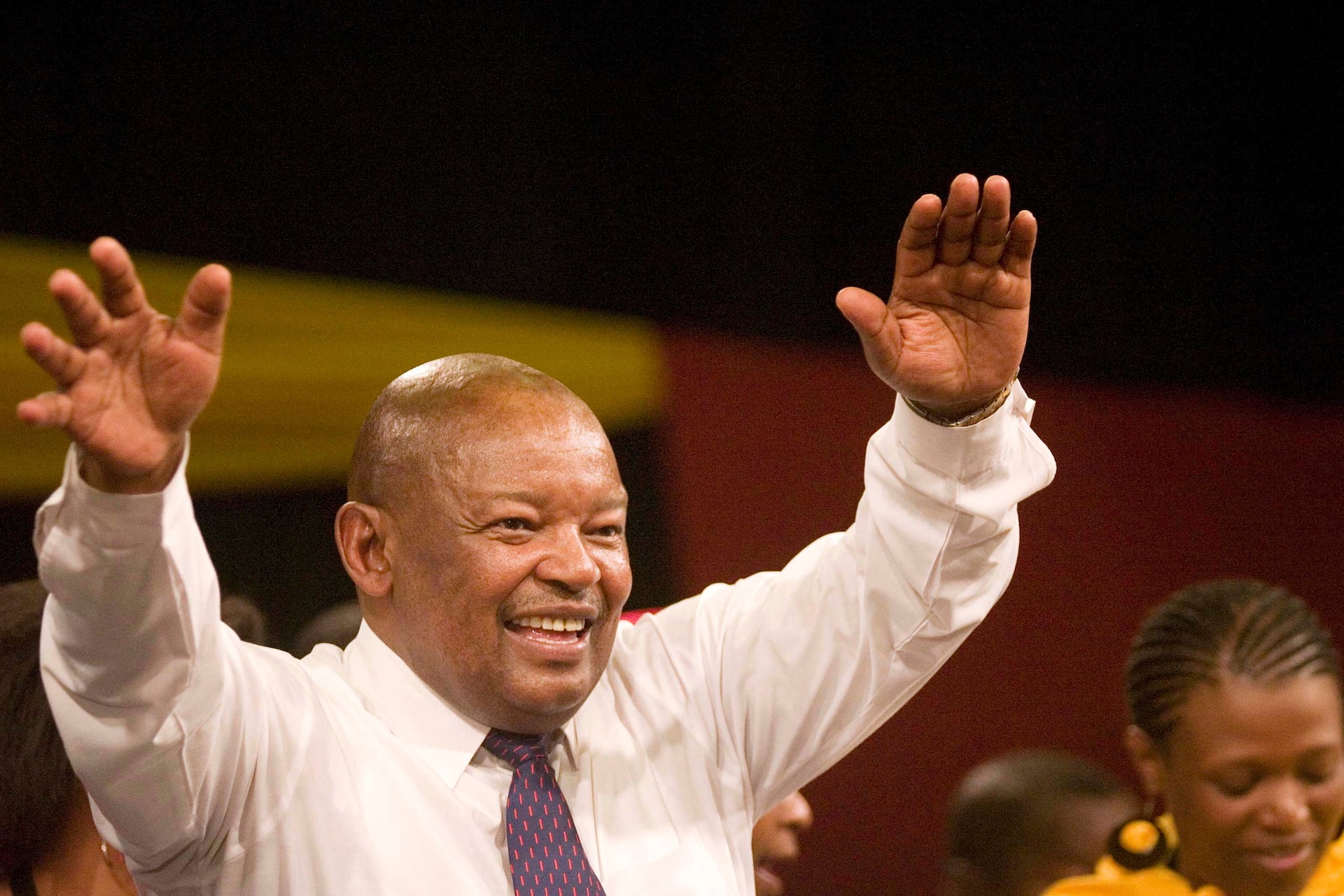 Former South African Defence Minister Mosiuoa Lekota waves to supporters after being elected leader of COPE in Bloemfontein