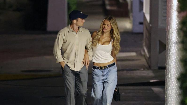 Taron Egerton couldn’t keep his hands off Brooks Nader (pictured here) as the couple was spotted having a beachside date together in California over the weekend.