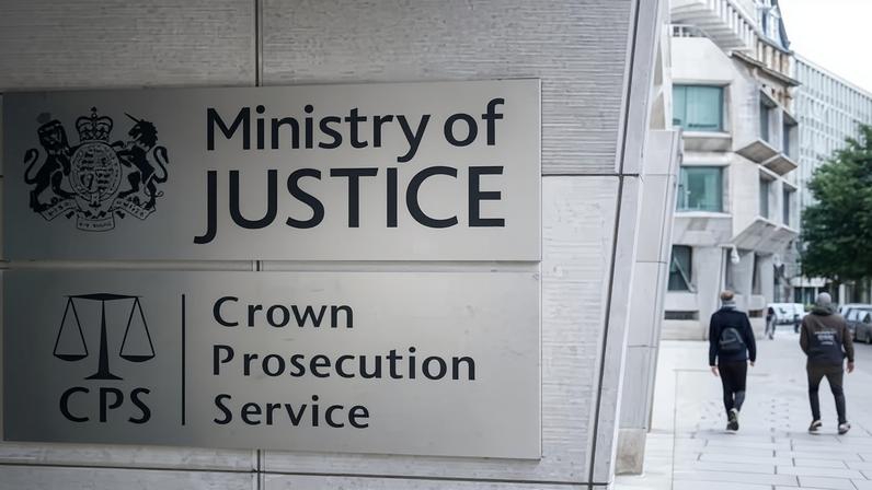 Sign for the MoJ and CPS on a building