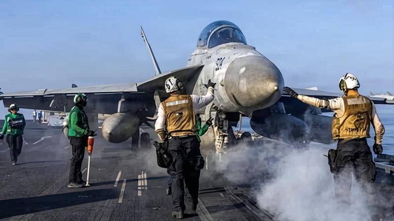 A fighter jet prepares to depart from USS Abraham Lincoln in support of US-Israeli action against Iran