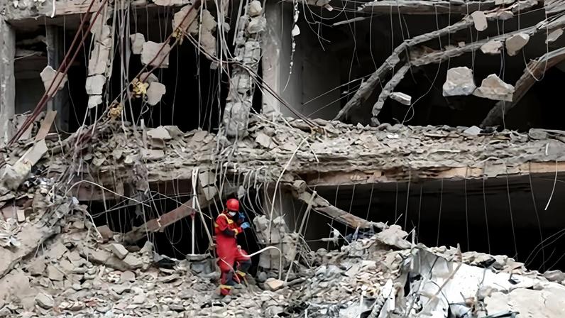 Damaged buildings in northern Tehran. Iranians fear catastrophe may simply have been postponed after Trump delayed attack plans.