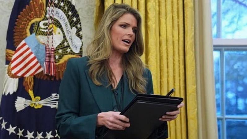 Lindsey Halligan speaks as Donald Trump signs executive orders in the Oval Office of the White House.