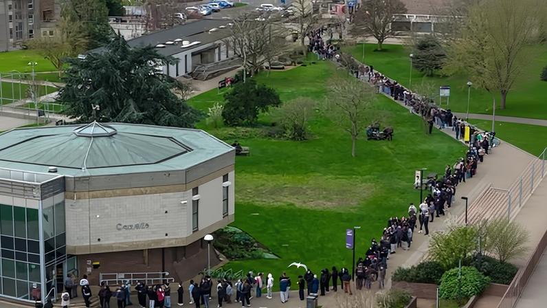 Students queue to receive antibiotics at the University of Kent in Canterbury after an outbreak of MenB.