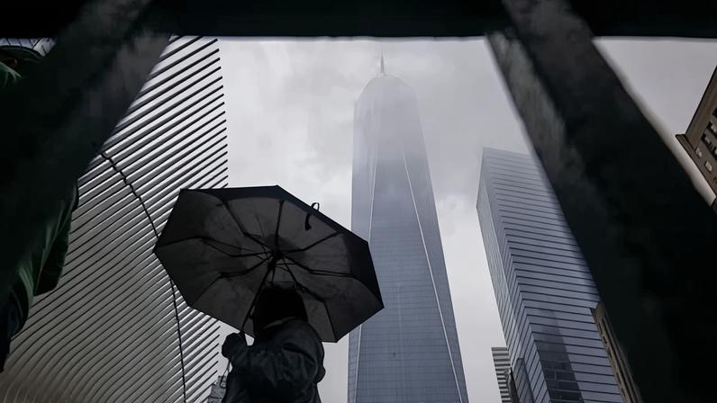 One World Trade Center is shrouded in fog and rain on 16 March 2026, in New York City.