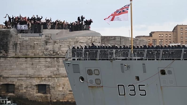 People wave goodbye as HMS Dragon sets sail from Portsmouth harbour on Tuesday 10 March.