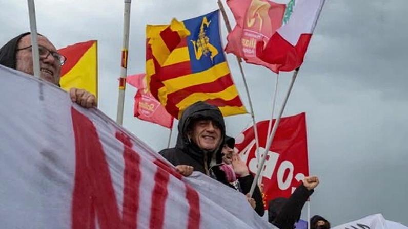 Protesters against the war in Iran gather outside the US air base in Sicily.