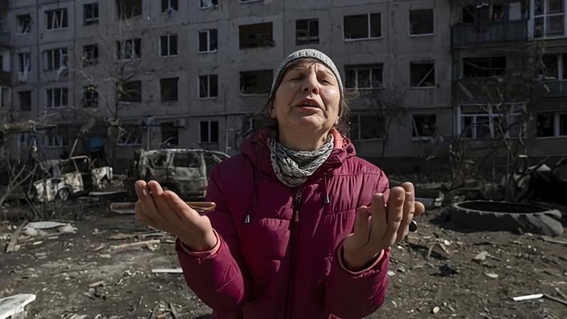 A woman cries in despair after a Russian airstrike in a residential area of Sloviansk, Ukraine. Russian forces have been slowly advancing to the north and east of the city, and children have been ordered to leave.