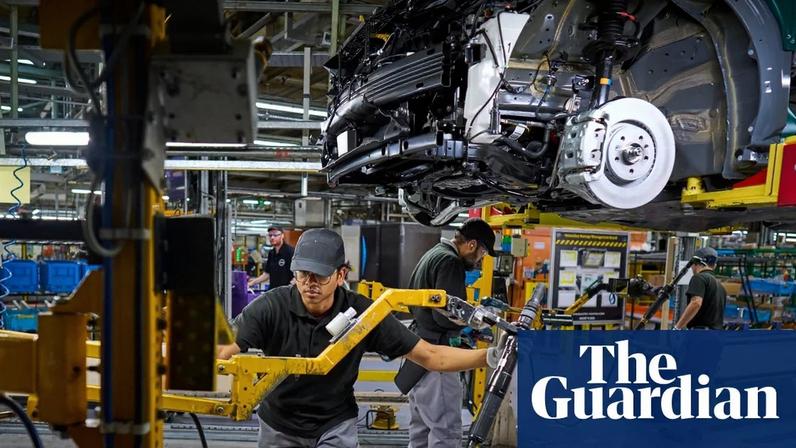 Employees on the Leaf EV production line at Sunderland.