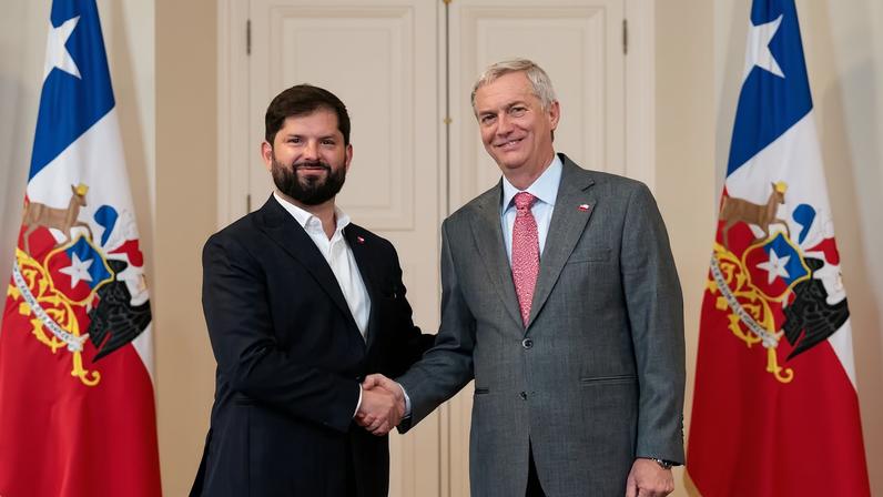 Chile's previous president Gabriel Boric (left) receives his successor José Antonio Kast (right) in December 2025