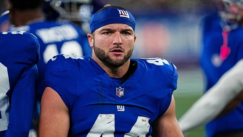 Cam Skattebo of the New York Giants looks on from the sideline during an October game at MetLife Stadium.