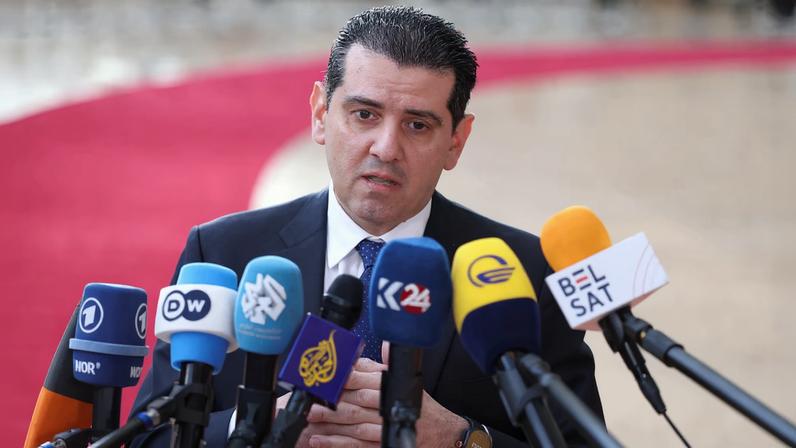 Cyprus' Minister of Energy, Commerce and Industry Michalis Damianos speaks to members of the media as he arrives to attend a European Union Energy and Foreign Affairs ministers meeting in Brussels, Belgium March 16, 2026. REUTERS/Omar Havana