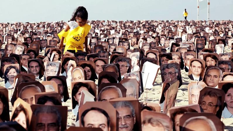 Bahais demonstrate on Rio de Janeiro's Copacabana Beach on June 19, 2011, asking Iranian authorities to release seven Bahai prisoners accused of spying for Israel and sentenced to 20 years in jail.