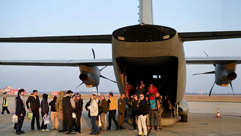 Repatriated Slovaks who were stranded in Jordan amid the U.S.-Israel conflict with Iran, arrive at M. R. Stefanik Airport, in Bratislava, Slovakia, March 3, 2026. REUTERS/Radovan Stoklasa