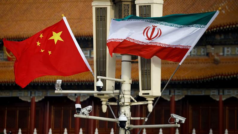 Flags of China and Iran fly in Tiananmen Square during Iranian President Raisi's visit to Beijing