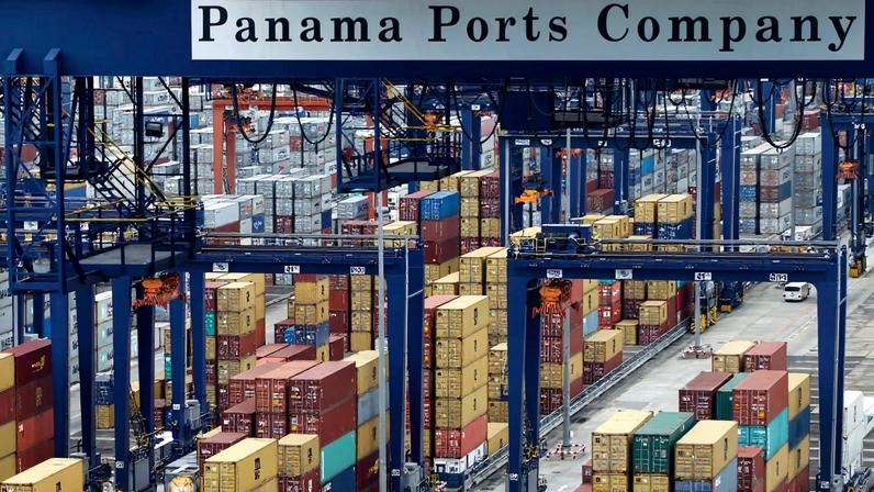 A Panama Ports Company sign is seen over containers at the Balboa port in Panama City