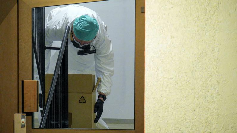 A forensic investigator works at the scene on Wednesday evening in connection with the detention of three brothers after the explosion at the U.S. embassy in Oslo on Sunday night, March 11, 2026. Stian Lysberg Solum /NTB/via REUTERS