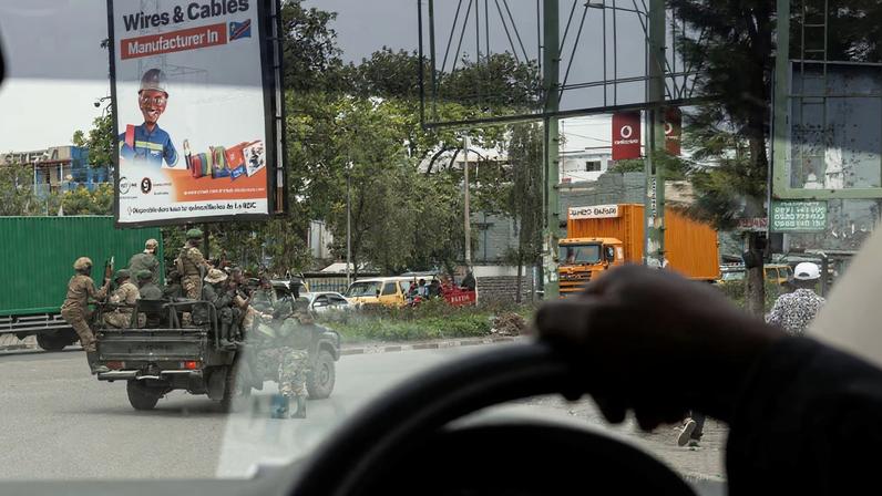 M23 rebels are seen through a car's window, sitting in their vehicle, in Goma, Democratic Republic of Congo, March 20, 2025. REUTERS/Zohra Bensemra/File Photo