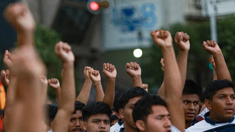 Students of the Ayotzinapa Rural Teachers' College take part in a march to demand justice in the 2014 disappearance of 43 students of Ayotzinapa Rural Teachers' College, in Mexico City, Mexico, June 26, 2025. REUTERS/Henry Romero