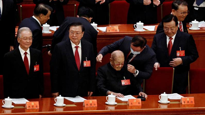 Retired official Song Ping arrives next to Wen Jiabao, former Chinese premier, Zhang Dejiang, former vice premier, and Zeng Qinghong, former vice president, for the opening ceremony of the 20th National Congress of the Communist Party of China, at the Great Hall of the People in Beijing, China October 16, 2022.
