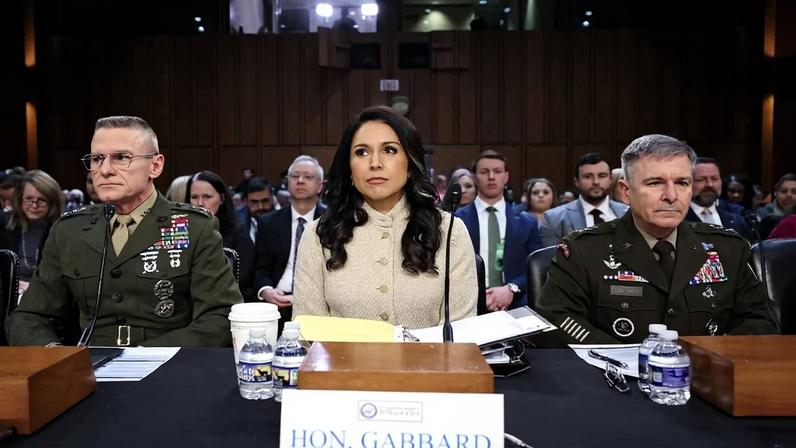 U.S. Director of National Intelligence Tulsi Gabbard sits between two uniformed military intelligence leaders inside the Senate Hart Building on Capitol Hill at the beginning of a Senate Intelligence Committee hearing on worldwide threats on March 18.