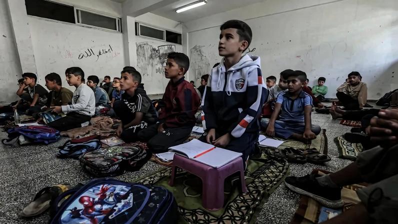 Palestinian students attend classes at Al-Razi School in Gaza City, Gaza, on Oct. 26, 2025.