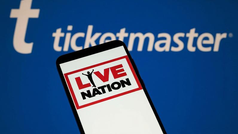The Live Nation logo is displayed on a mobile phone with Ticketmaster branding seen in the background in this photo illustration in Brussels, Belgium, on October 25, 2025. (Photo by Jonathan Raa/NurPhoto via Getty Images)