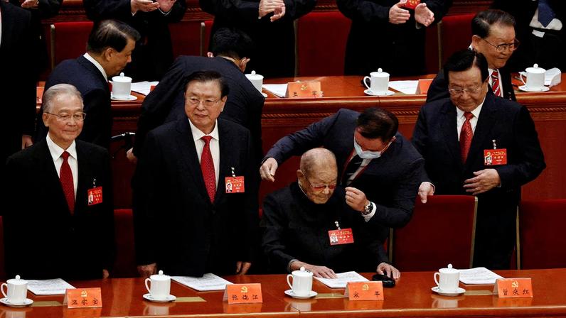 Retired official Song Ping arrives next to Wen Jiabao, former Chinese premier, Zhang Dejiang, former vice premier, and Zeng Qinghong, former vice president, for the opening ceremony of the 20th National Congress of the Communist Party of China, at the Great Hall of the People in Beijing, China October 16, 2022. REUTERS/Thomas Peter/File Photo
