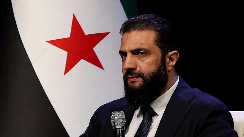 Syrian President Ahmed al-Sharaa attends the Ministry of Awqaf conference titled "Unity of Islamic Discourse" at the Conference Palace in Damascus, Syria, February 16, 2026. REUTERS/Khalil Ashawi/File Photo