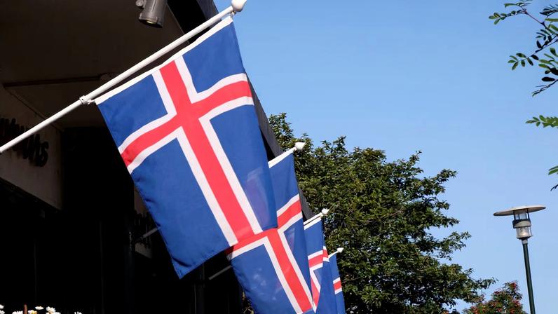 Iceland's national flags flutter over the souvenir shop in Reykjavik