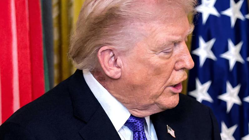 A patch of blemished skin is visible over U.S. President Donald Trump’s shirt collar during a Medal of Honor ceremony at the White House in Washington, D.C., U.S., March 2, 2026.