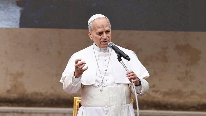 Pope Leo XIV speaks to faithful during a visit to the parish complex of Sacro Cuore di Gesu in Ponte Mammolo, where he stressed that conflicts cannot be resolved through war and called for...