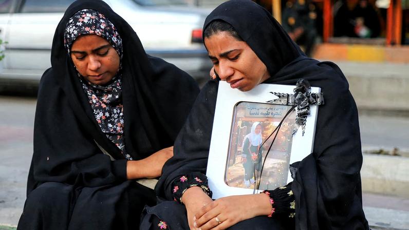 People mourn on the day of the funeral of the victims following a reported strike on a school in Minab, Iran, March 3, 2026. Amirhossein Khorgooei/ISNA/WANA (West Asia News Agency) via REUTERS