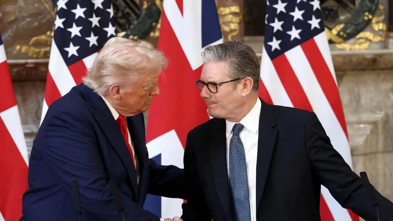 U.S. President Donald Trump and British Prime Minister Keir Starmer shake hands during a press conference following their meeting at Chequers, near Aylesbury, Britain, September 18, 2025.