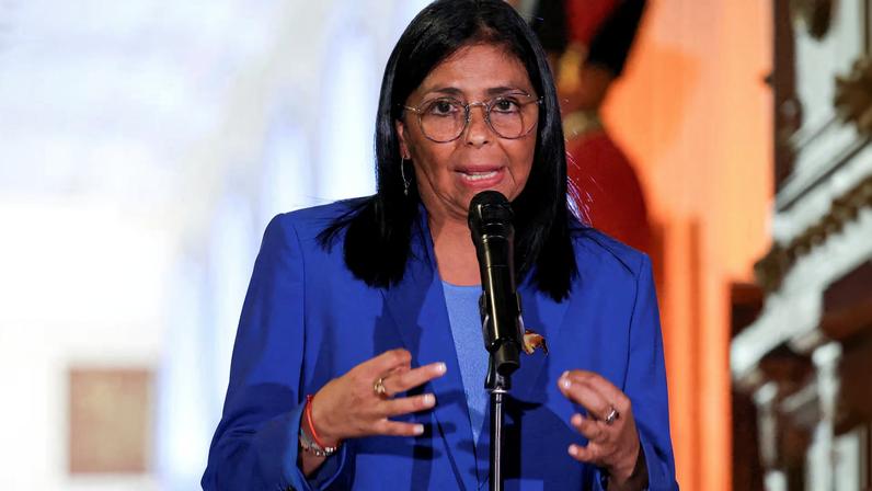 Venezuela's interim President Delcy Rodriguez speaks after receiving the text of the amnesty law meant to grant immediate clemency to individuals jailed for participating in political protests, in Caracas