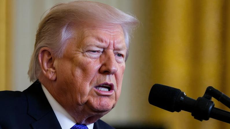 U.S. President Donald Trump speaks, as a patch of blemished skin is visible above his shirt collar, during a Medal of Honor ceremony at the White House in Washington, D.C., U.S., March 2, 2026.