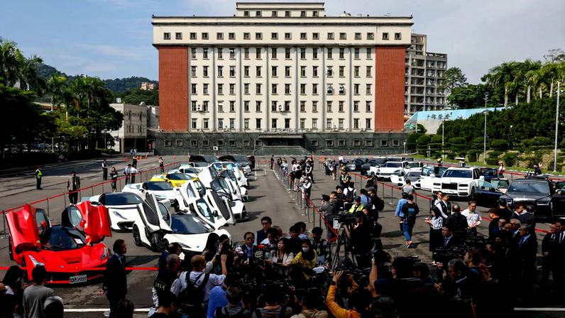 Luxury cars on display as Taiwan auctions off luxury cars linked to the Cambodian scam centre Prince Group, in Taipei